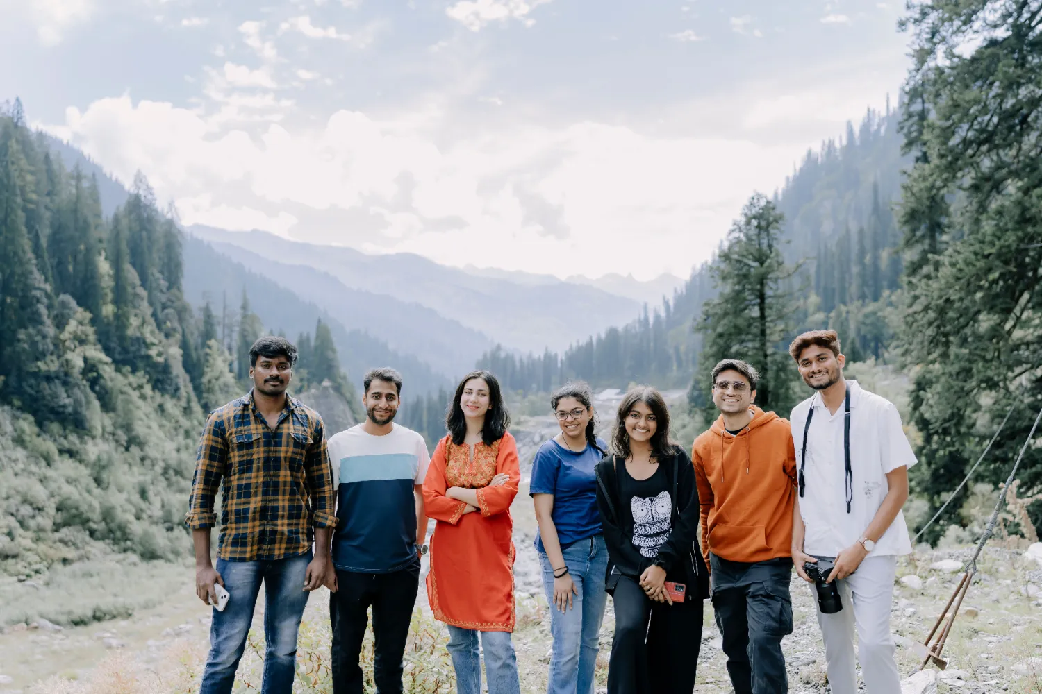 A group standing in a northern Ontario valley on a budget day trip from Toronto